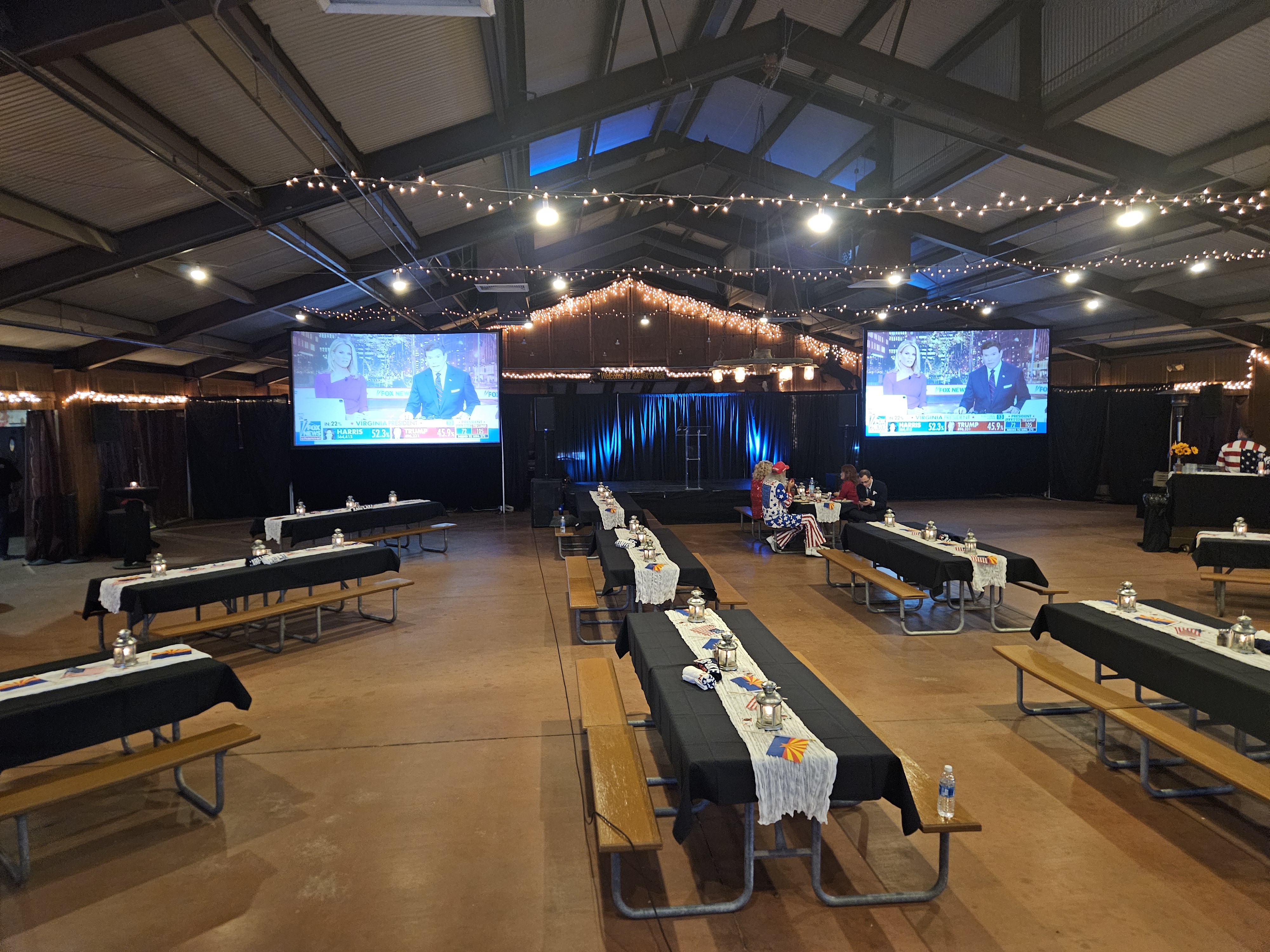 Event production in Phoenix with dual projection screens, stage, lighting and audience seating